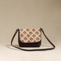 Handcrafted quilted ajrakh block printed fabric sling bag