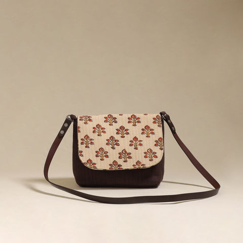 Handcrafted quilted ajrakh block printed fabric sling bag