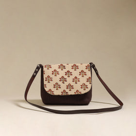 Handcrafted quilted ajrakh block printed fabric sling bag