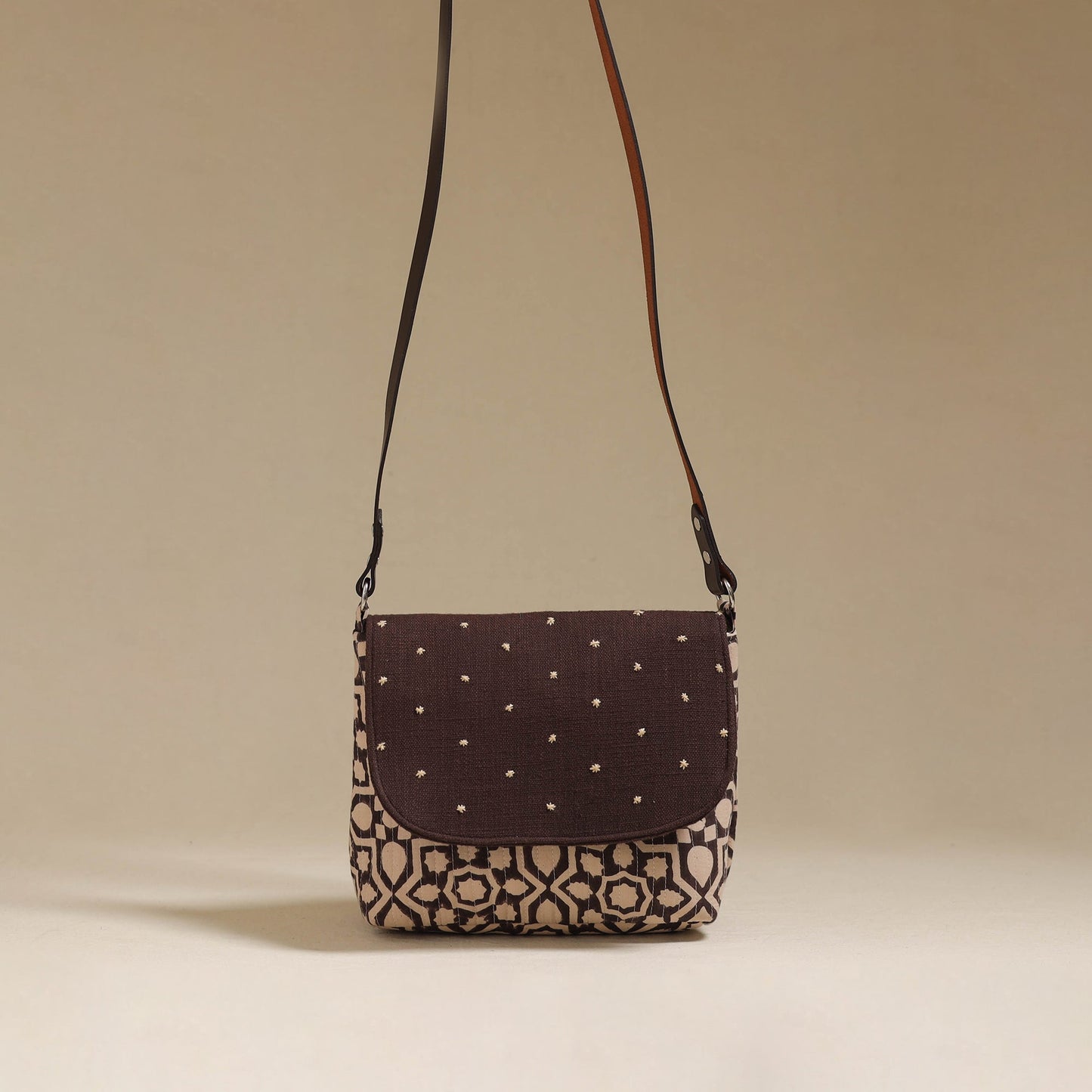 Handcrafted quilted ajrakh block printed fabric sling bag