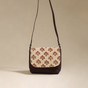 Handcrafted quilted ajrakh block printed fabric sling bag