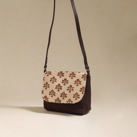 Handcrafted quilted ajrakh block printed fabric sling bag