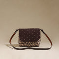 Handcrafted quilted ajrakh block printed fabric sling bag