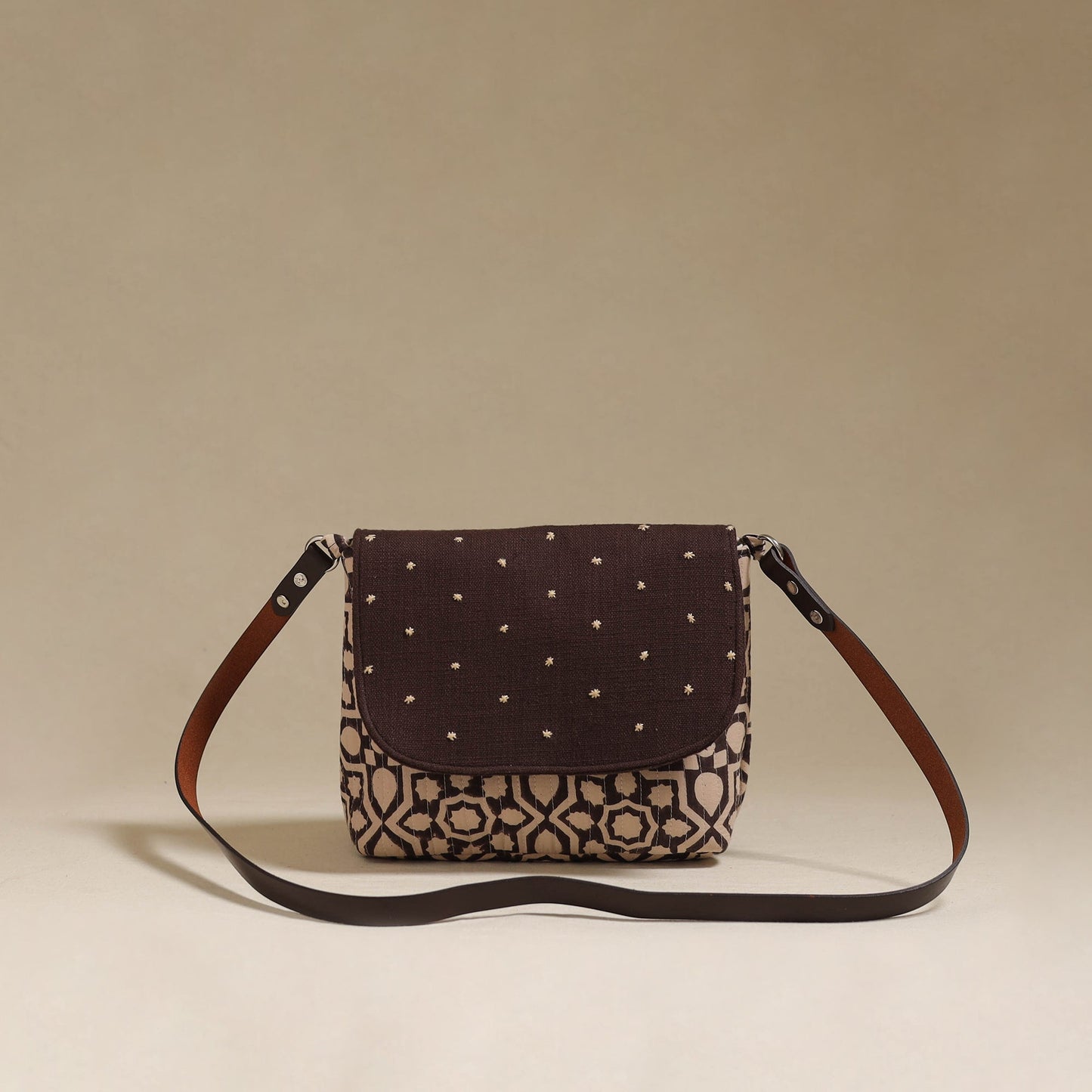 Handcrafted quilted ajrakh block printed fabric sling bag