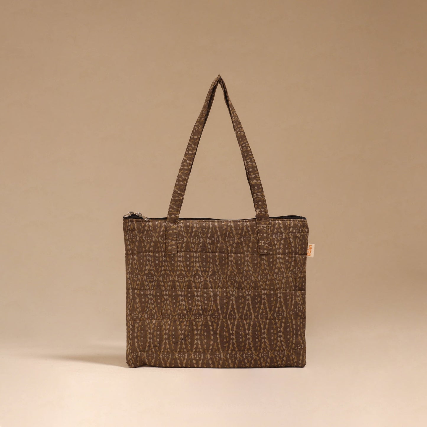 Handcrafted quilted handbag 17