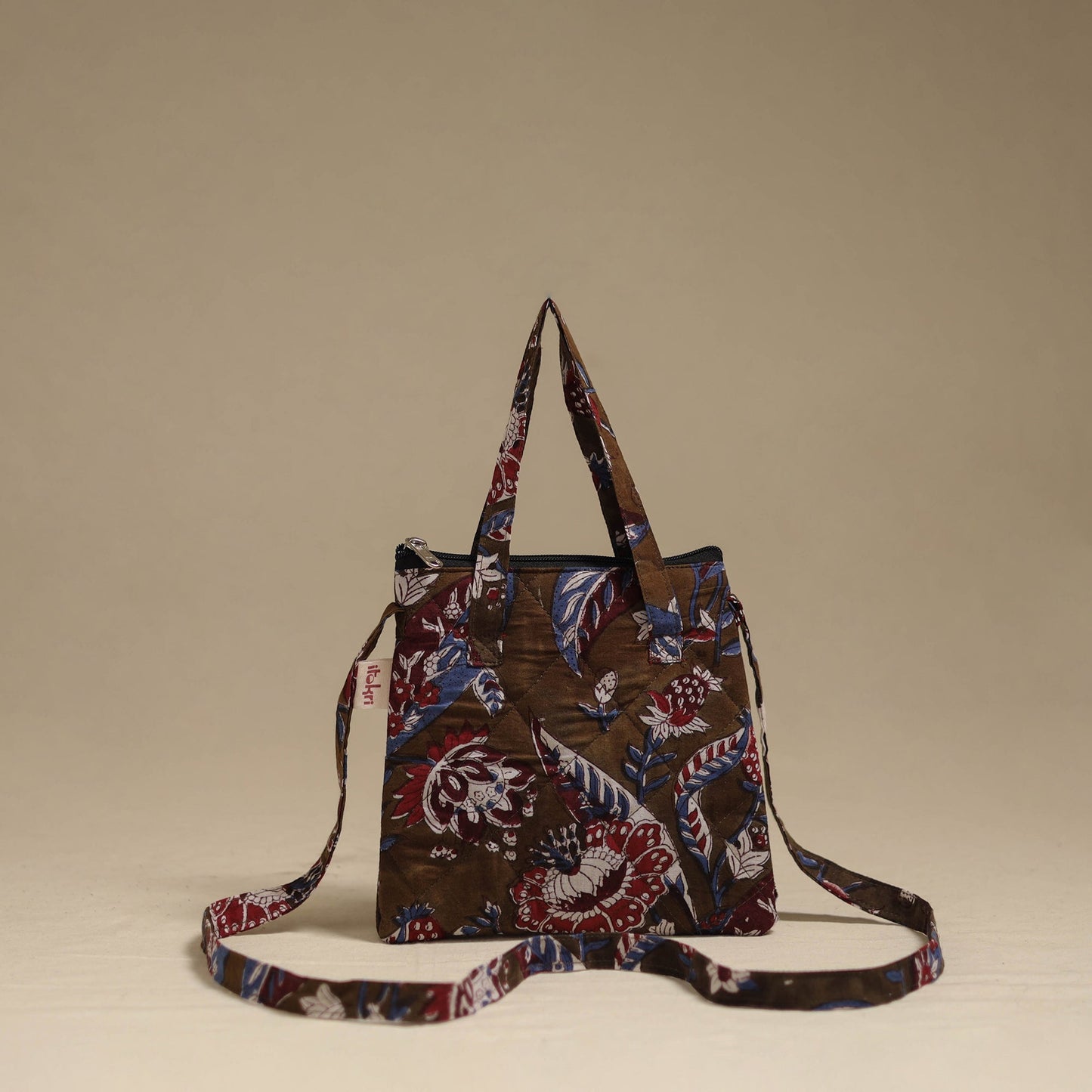 Handcrafted quilted sling bag 12
