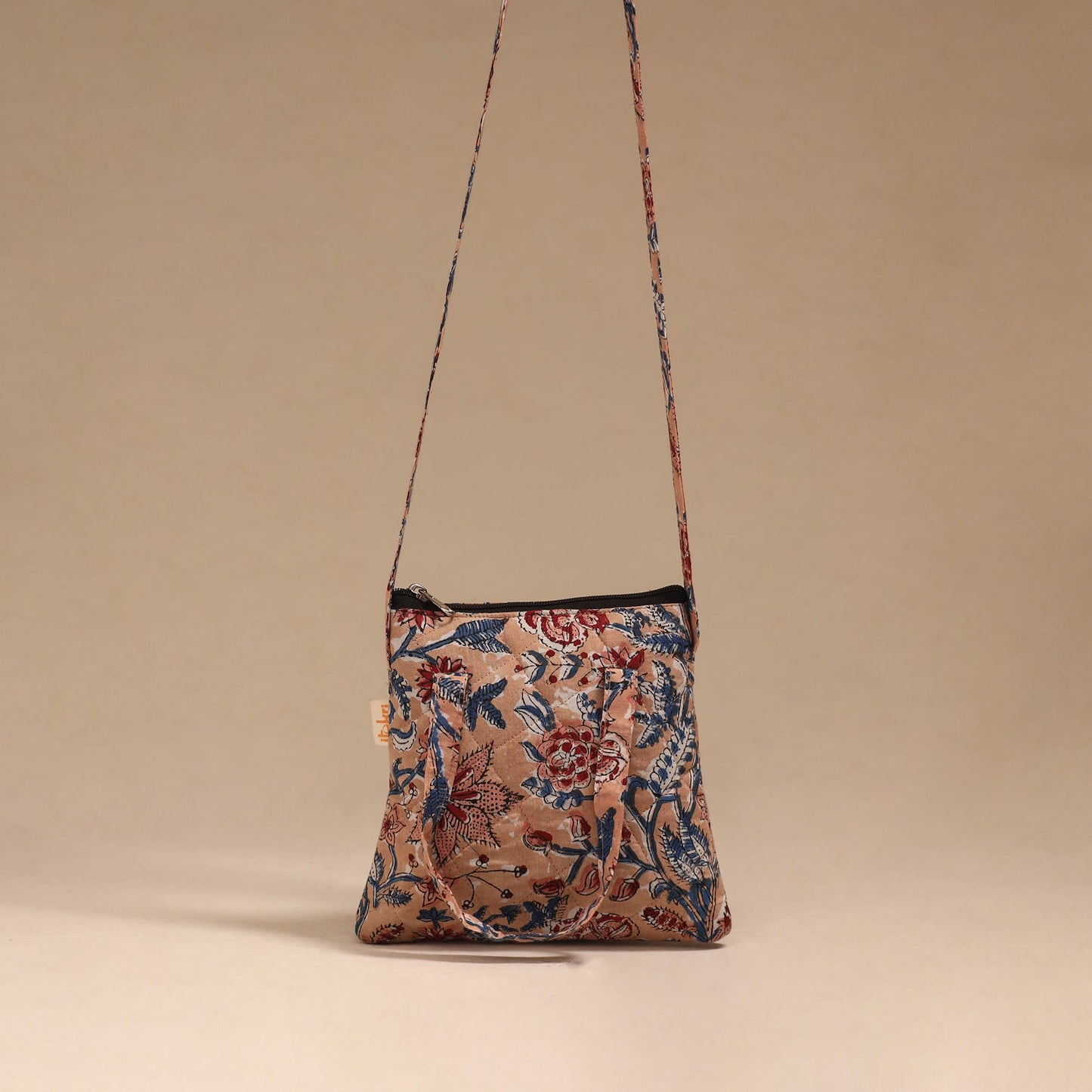 Handcrafted quilted sling bag 14