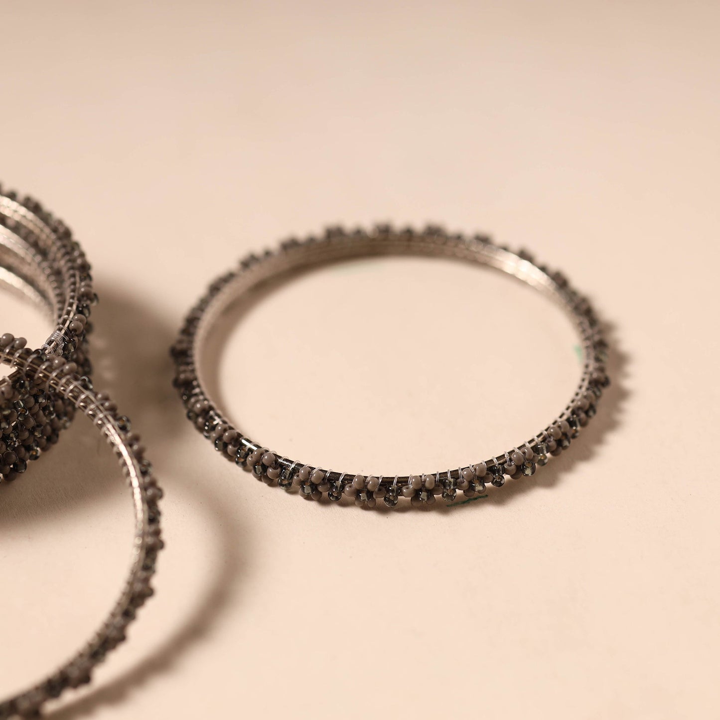 Brown - hapur flower beadwork bangles by aagaz (set of 6)