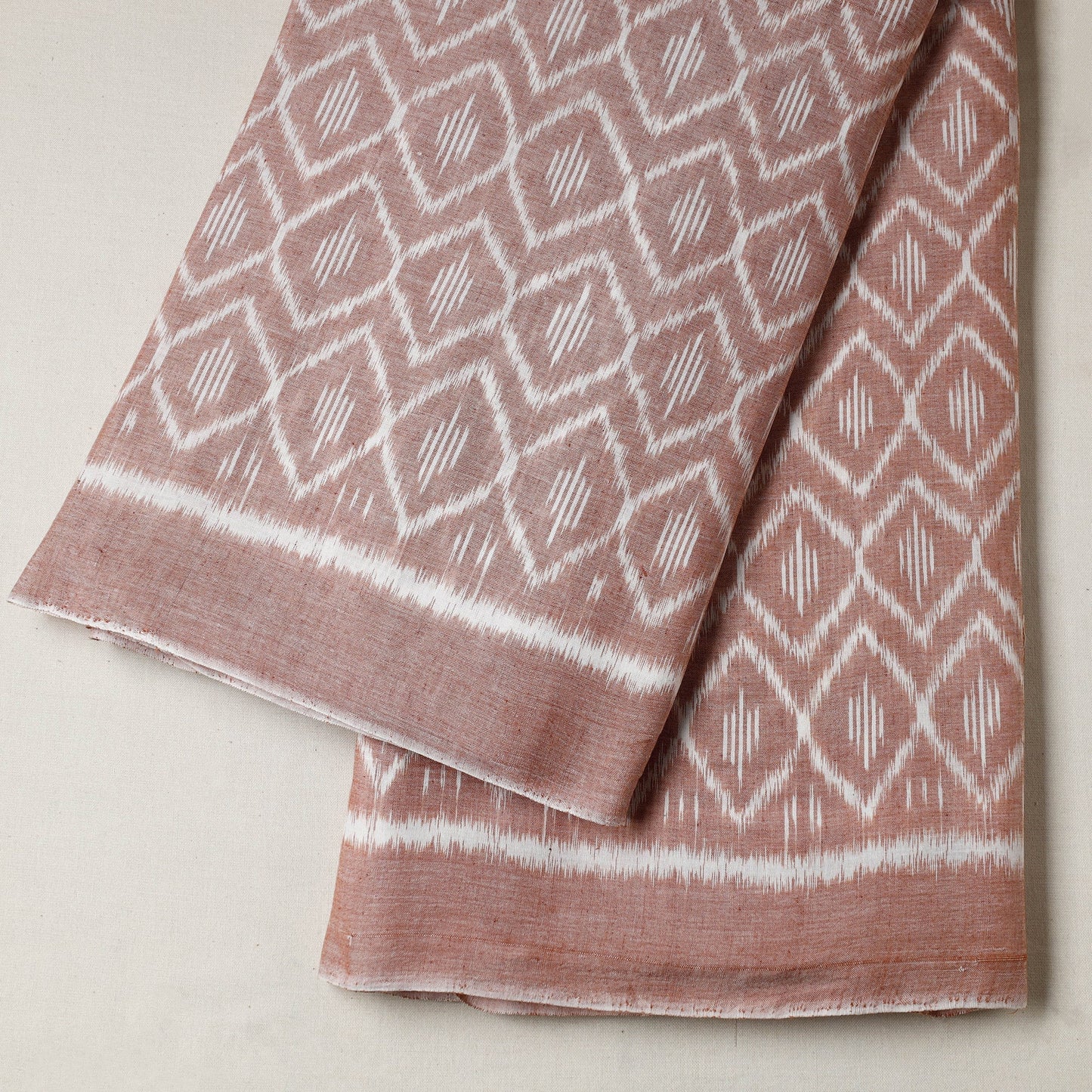 Buy Maniabandha Ikat Weave Handloom Cotton Fabric Online at iTokri.com