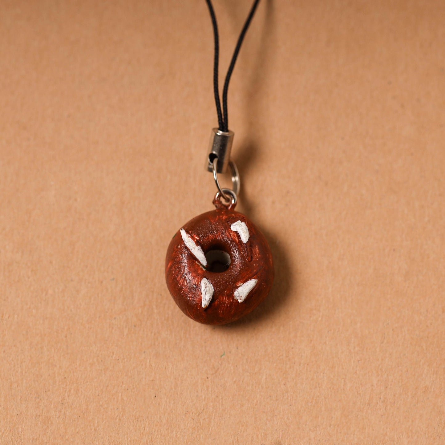 Brown - quirklets handpainted clay bag doughnut charm