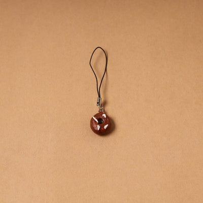 Brown - quirklets handpainted clay bag doughnut charm