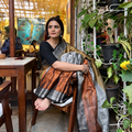 Multicolor Burdwan Tissue Zari Work Handloom Saree, draped and worn by a woman, AI visual of the saree, iTokri