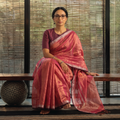 Pink Burdwan Tissue Zari Work Handloom Saree, draped and worn by a woman, AI visual of the saree, iTokri