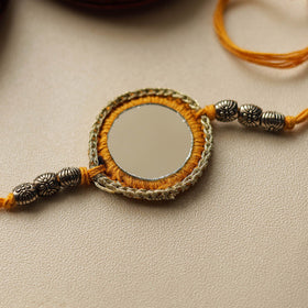 Chakra - Mirror & Crochet Work Rakhi by Abira Creations