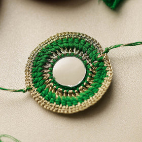 Chakra - Mirror & Crochet Work Rakhi by Abira Creations