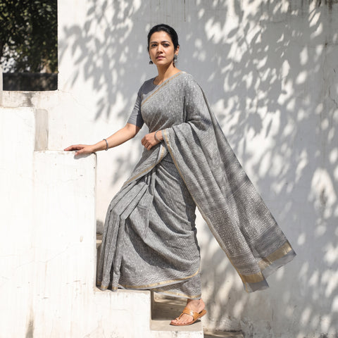 Grey Chanderi Silk Akola Hand Block Print Natural Dyed Saree, draped and worn by a woman, AI visual of the saree, iTokri