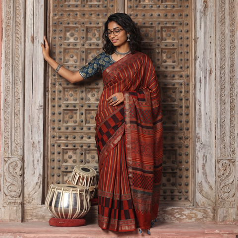 Red Chanderi Silk Block Print Ajrakh Saree, draped and worn by a woman, AI visual of the saree, iTokri
