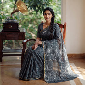 Grey Chanderi Silk Hand Block Print Bagru Saree with Zari Border, draped and worn by a woman, AI visual of the saree, iTokri