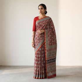 Red Chanderi Silk Natural Dyed Hand Block Dabu Bagru Print Saree, draped and worn by a woman, AI visual of the saree, iTokri