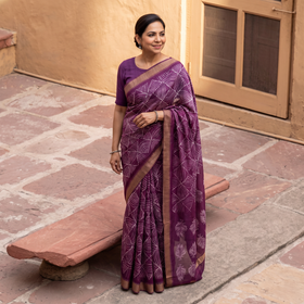 Purple Chanderi Silk Nui Shibori Tie-Dye Saree with Ghicha Border, draped and worn by a woman, AI visual of the saree, iTokri