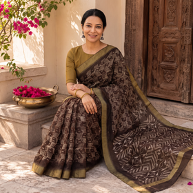 Brown Chanderi Silk Nui Shibori Tie-Dye Saree with Ghicha Border, draped and worn by a woman, AI visual of the saree, iTokri