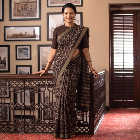 Brown Chanderi Silk Nui Shibori Tie-Dye Saree with Ghicha Border, draped and worn by a woman, AI visual of the saree, iTokri
