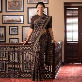 Brown Chanderi Silk Nui Shibori Tie-Dye Saree with Ghicha Border, draped and worn by a woman, AI visual of the saree, iTokri