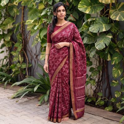 Maroon Chanderi Silk Nui Shibori Tie-Dye Saree with Ghicha Border, draped and worn by a woman, AI visual of the saree, iTokri