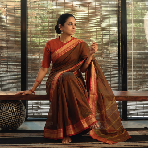 Brown Chettinad Cotton Saree with Border, draped and worn by a woman, AI visual of the saree, iTokri