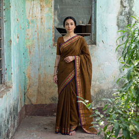 Brown Chettinad Cotton Saree with Border, draped and worn by a woman, AI visual of the saree, iTokri