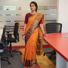 Orange Chettinad Cotton Saree with Border, draped and worn by a woman, AI visual of the saree, iTokri