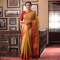 Yellow Chettinad Woven Cotton Saree with Border, draped and worn by a woman, AI visual of the saree, iTokri