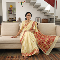 Yellow Chinon Silk Hand Embroidery Phulkari Saree, draped and worn by a woman, AI visual of the saree, iTokri