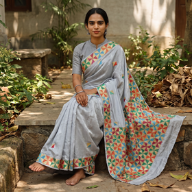 Grey Chinon Silk Hand Embroidery Phulkari Saree, draped and worn by a woman, AI visual of the saree, iTokri