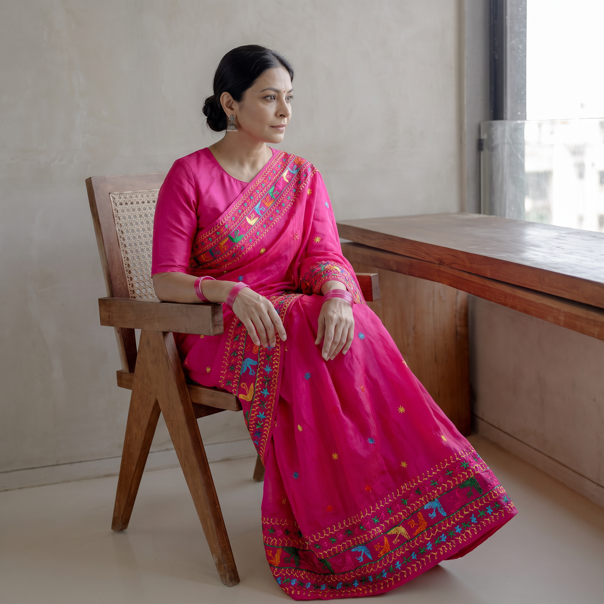 Pink Chinon Silk Hand Embroidery Phulkari Saree, draped and worn by a woman, AI visual of the saree, iTokri