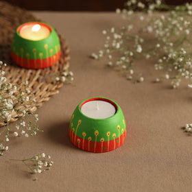  Circle - Handpainted Clay Candle Holders (Set of 2) Online in India l iTokri.com 