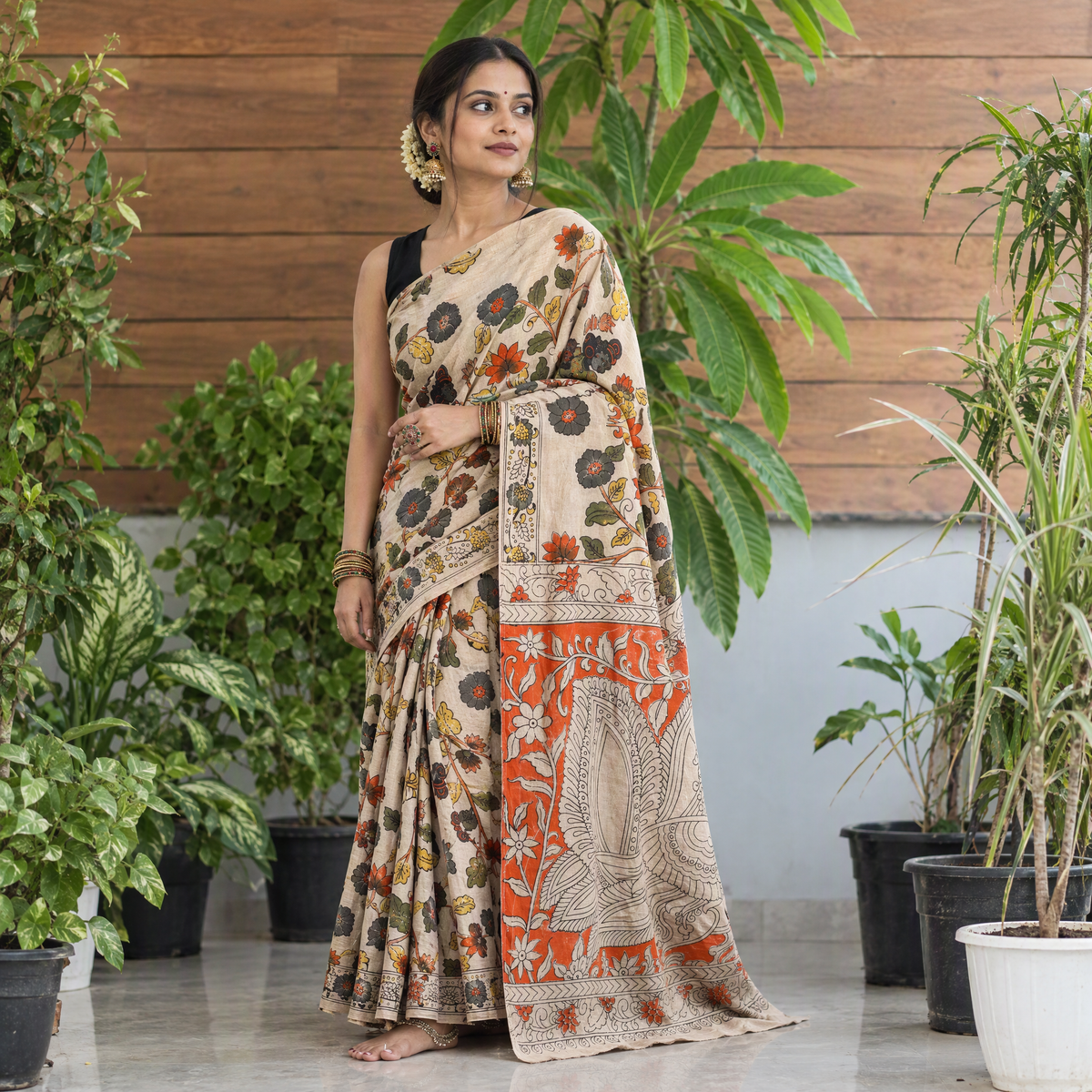 Beige Cotton Saree in Kalamkari Print, draped and worn by a woman, AI visual of the saree, iTokri