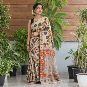 Beige Cotton Saree in Kalamkari Print, draped and worn by a woman, AI visual of the saree, iTokri