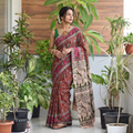 Orange Cotton Saree in Kalamkari Print, draped and worn by a woman, AI visual of the saree, iTokri