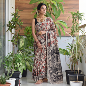 Beige Cotton Saree in Kalamkari Print, draped and worn by a woman, AI visual of the saree, iTokri