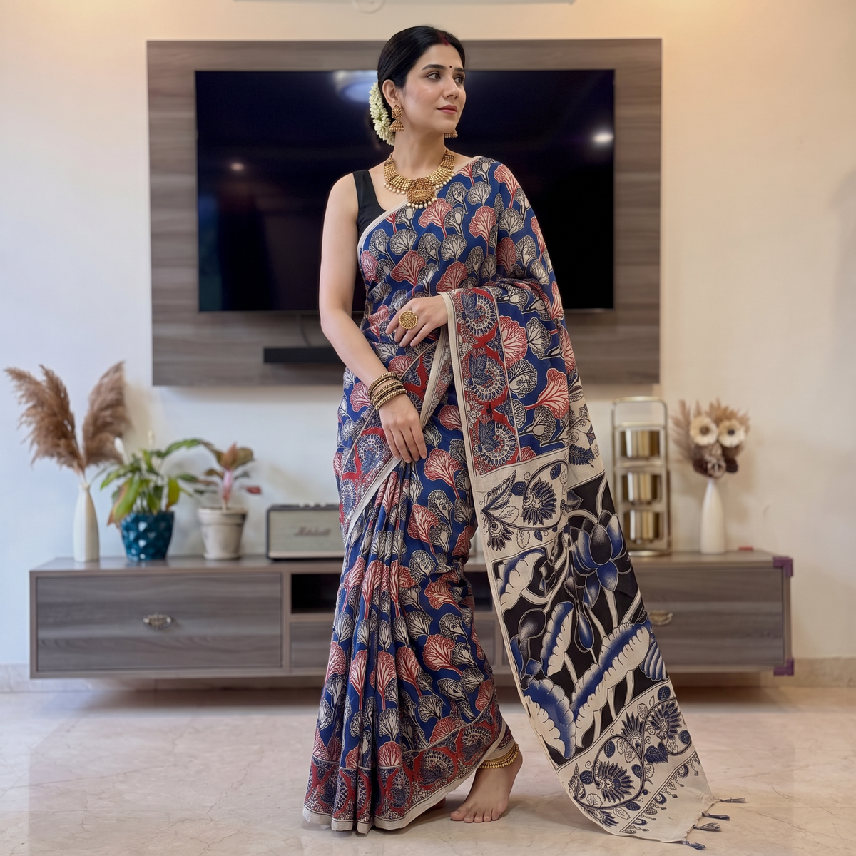 Multicolor Cotton Saree in Kalamkari Print, draped and worn by a woman, AI visual of the saree, iTokri