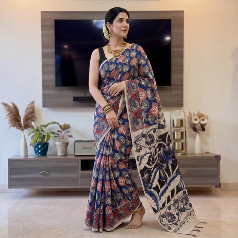 Multicolor Cotton Saree in Kalamkari Print, draped and worn by a woman, AI visual of the saree, iTokri