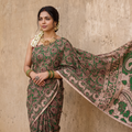 Brown Cotton Saree in Kalamkari Print, draped and worn by a woman, AI visual of the saree, iTokri