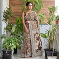 Yellow Cotton Saree in Kalamkari Print, draped and worn by a woman, AI visual of the saree, iTokri