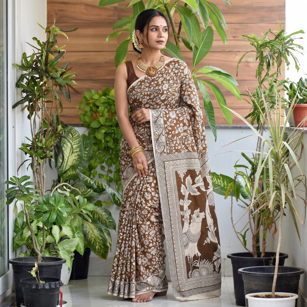 Yellow Cotton Saree in Kalamkari Print, draped and worn by a woman, AI visual of the saree, iTokri