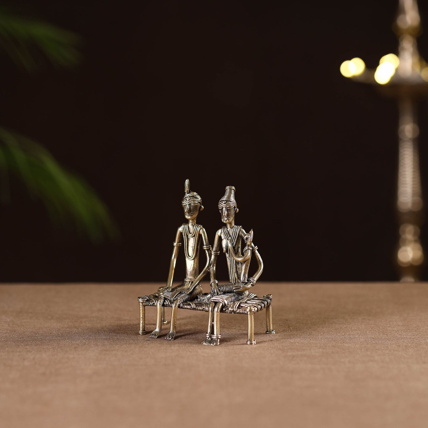 Couple child on cot - tribal odisha dokra handmade home