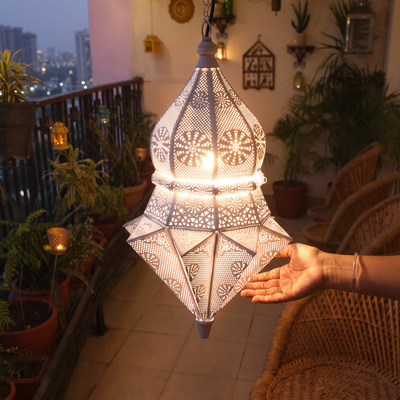 Decorative Handmade Hanging Iron Electric Lantern / Lamp, lit in a home in the evening, AI visual of the light, iTokri