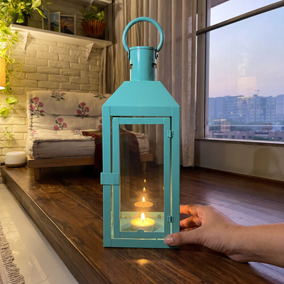 Decorative Handmade Hanging Iron Lantern (Medium), lit in a home in the evening, AI visual of the light, iTokri