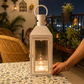 Decorative Handmade Hanging Iron Lantern (Medium), lit in a home in the evening, AI visual of the light, iTokri