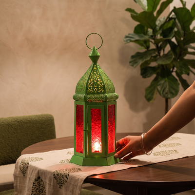 Decorative Handmade Hanging Moroccan Lantern, lit in a home in the evening, AI visual of the light, iTokri